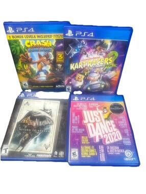 PS4 Game Lot of 4 Batman Return to Arkham, Crash Trilogy, Kart Racers, JD2020